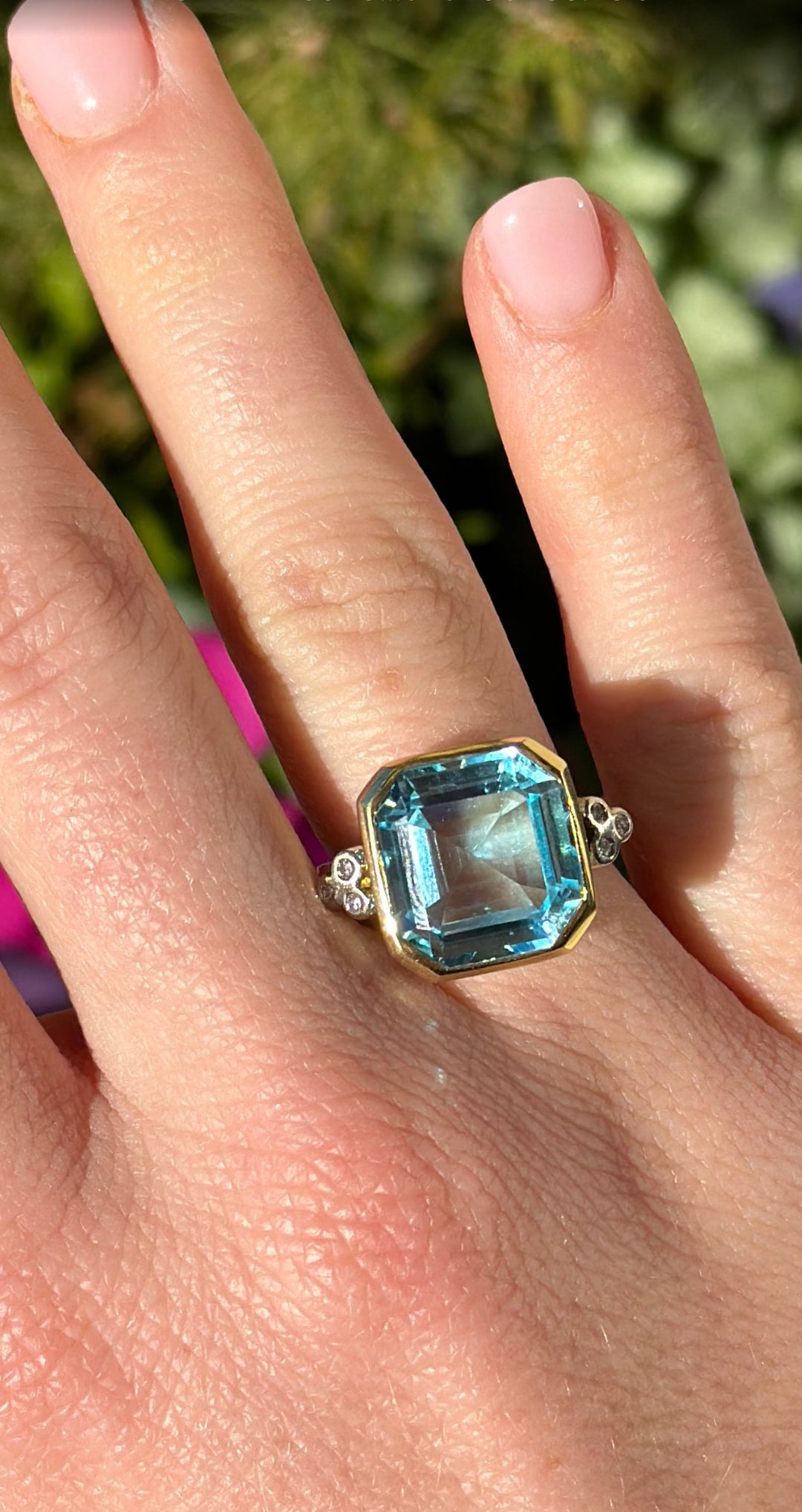 14kt Octagon Blue Topaz .09ct Diamond Ring