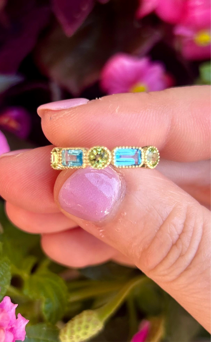 14kt Emerald Cut Blue Topaz and Round Peridot Band
