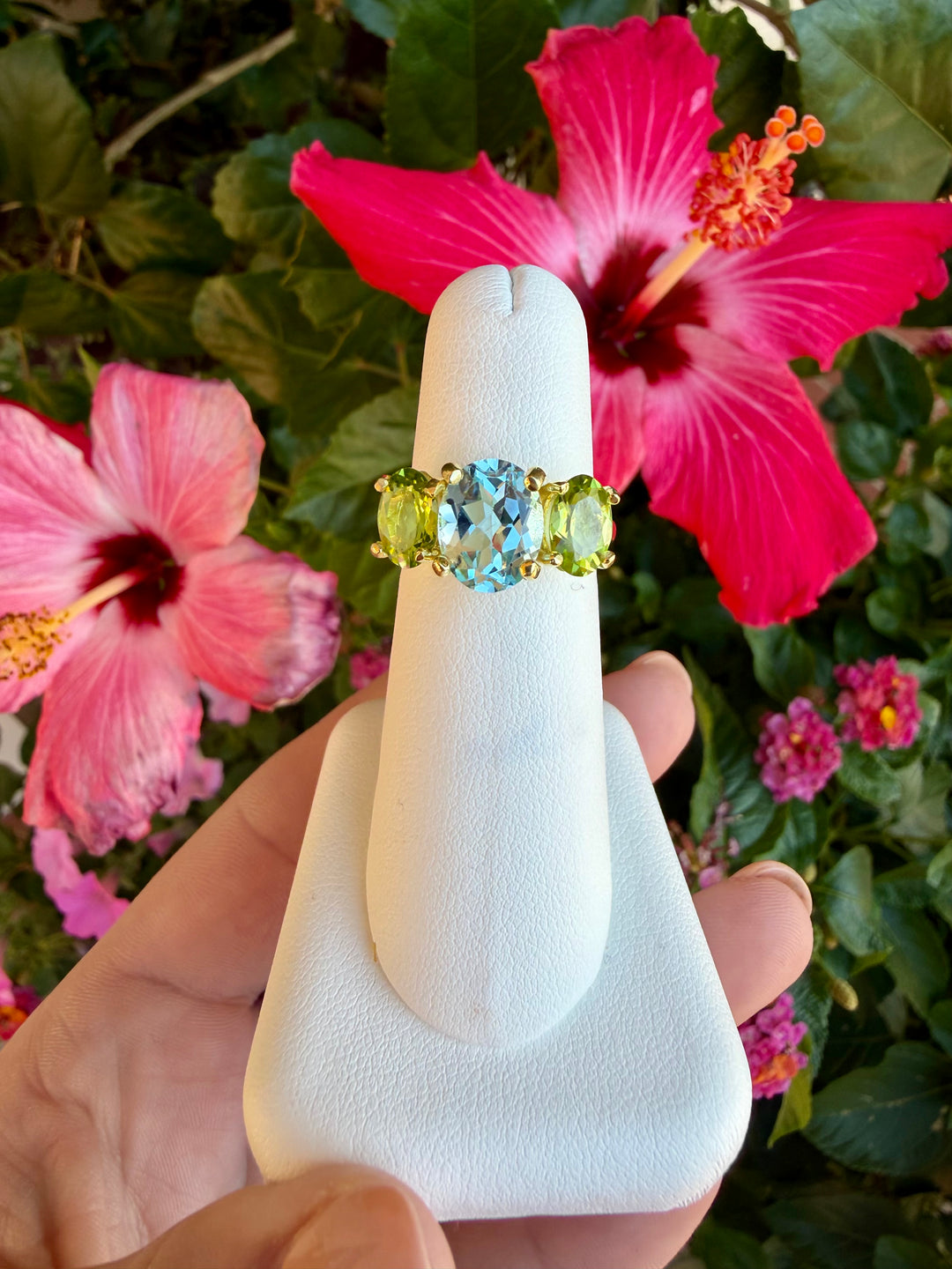 14kt Gold Ring with Oval Sky Blue Topaz Center & Peridot Sides RZ7558