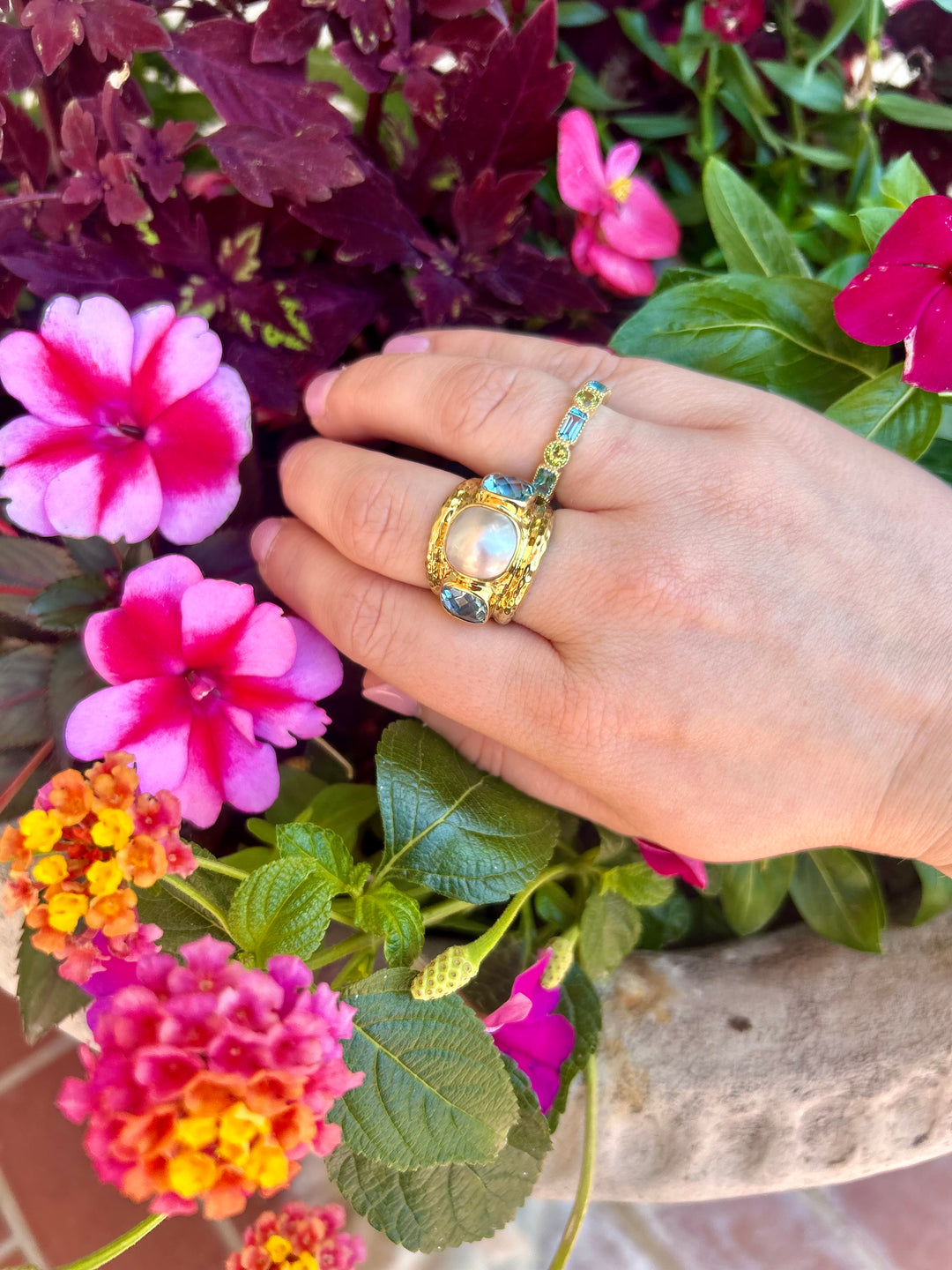 14kt Emerald Cut Blue Topaz and Round Peridot Band