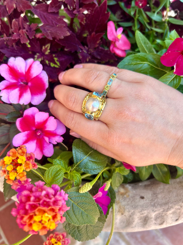 14kt Emerald Cut Blue Topaz and Round Peridot Band
