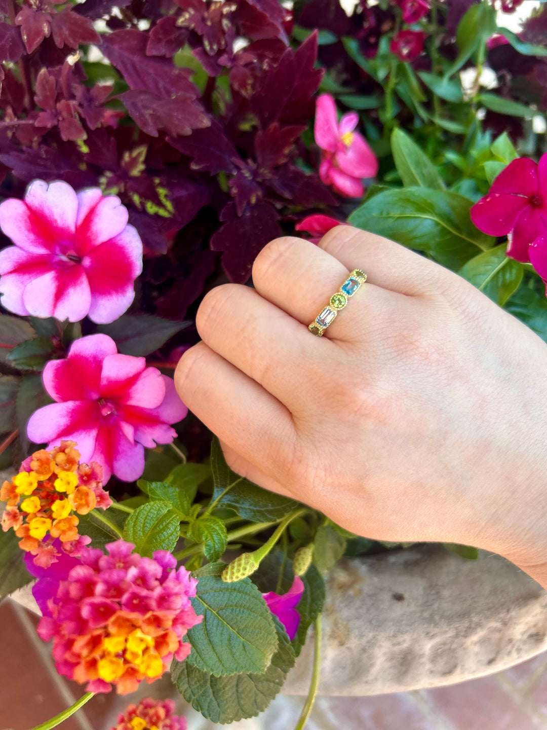 14kt Emerald Cut Blue Topaz and Round Peridot Band