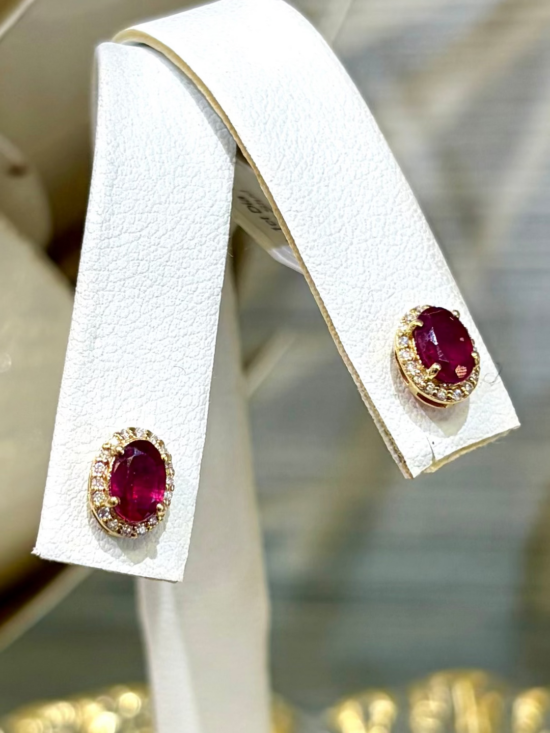 14kt Gold .1ct Diamond/1.5ct Ruby Stud - Charlotte's Inc