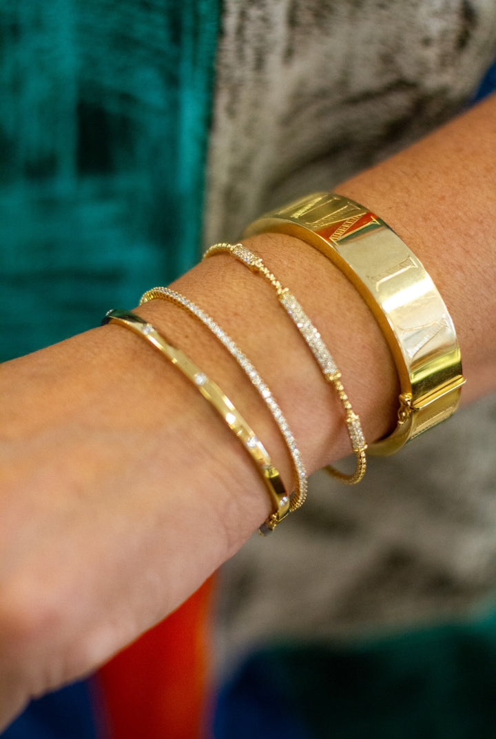 14kt .30cts 5 Diamond Bezel Set Bangle