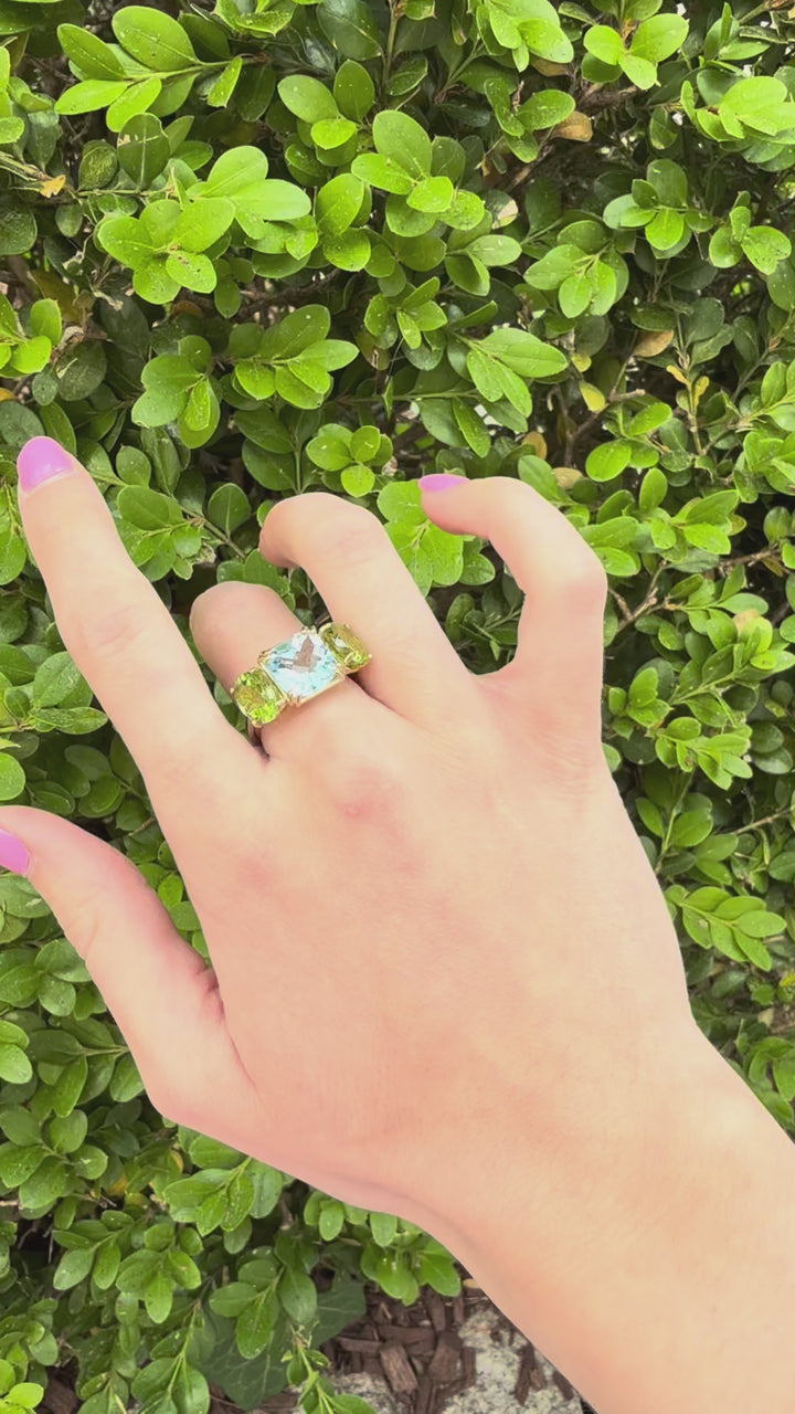 14kt Gold Ring with Blue Topaz Center & Peridot Sides RZ6436